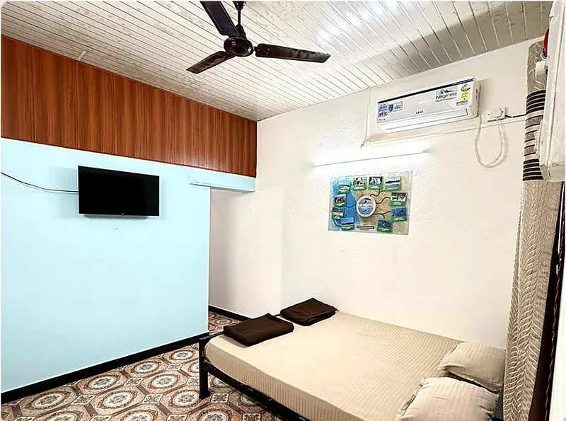 Room 2 queen bed with split AC above