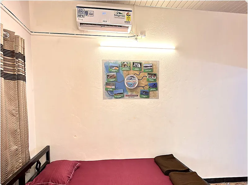 Room 3 king bed with the wardrobe and door, Konkan Central Homestay