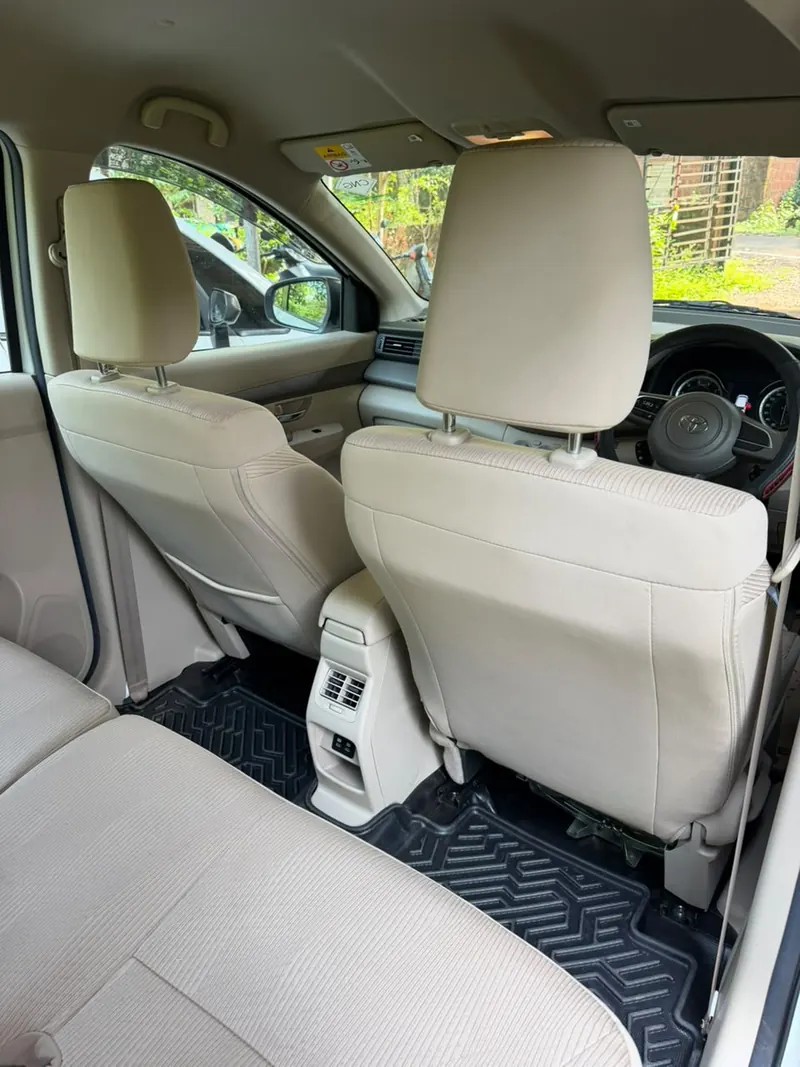 Inside the Toyota Rumion: rear AC vents and the driver's seat